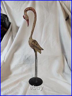 Metal pink flamingo yard ornament